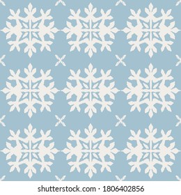 Christmas drawing with snowflakes. The Nordic style. Folk print with flakes. Scandinavian, Portuguese ornament. Spanish porcelain. Oriental damask. Ethnic motif. Ikat geometric folklore background. 