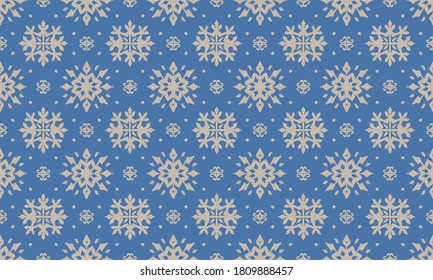 Christmas drawing with snowflakes. The Nordic style. Folk print with flakes. Scandinavian, Portuguese ornament. Spanish porcelain. Oriental damask. Ethnic motif. Ikat geometric folklore background. 
