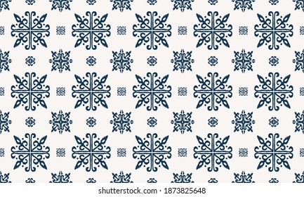 Christmas drawing with snowflakes. The Nordic style. Folk print with flakes. Scandinavian, Portuguese ornament. Spanish porcelain. Oriental damask. Ethnic motif. Ikat geometric folklore background. 