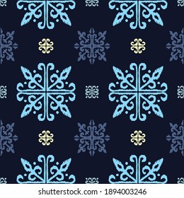 Christmas drawing with snowflakes. The Nordic style. Folk print with flakes. Scandinavian, Portuguese ornament. Spanish porcelain. Oriental damask. Ethnic motif. Ikat geometric folklore background. 