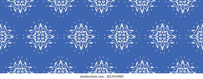 Christmas drawing with snowflakes. The Nordic style. Folk print with flakes. Scandinavian, Portuguese ornament. Spanish porcelain. Oriental damask. Ethnic motif. Ikat geometric folklore background. 