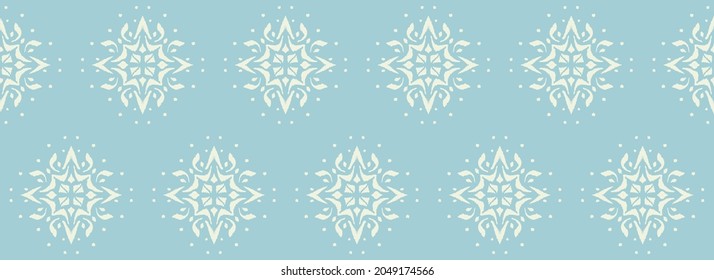 Christmas drawing with snowflakes. The Nordic style. Folk print with flakes. Scandinavian, Portuguese ornament. Spanish porcelain. Oriental damask. Ethnic motif. Ikat geometric folklore background. 