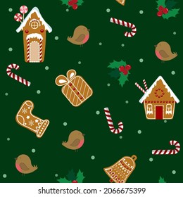 Christmas elements seamless pattern with gingerbread cookies, holly and birds on a green background. Seamless vector illustration. For decoration textile, packaging.