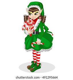 Christmas elf with candy. insulated on white background.