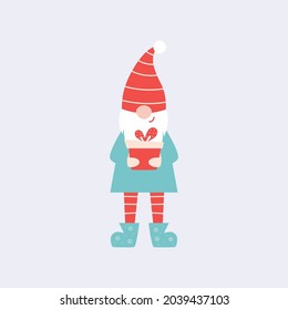 Elfo de Navidad. Gnome con presente. Feliz Navidad. Feliz año nuevo. Tiempo de invierno 