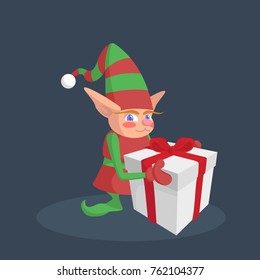 Christmas elf holding a gift with a red ribbon