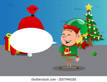 Christmas Elf holding small gift box. Vector cartoon character illustration of Santa Claus's little worker, helper.