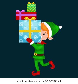 Christmas elf isolated stack of box in a green suit with, assistant of Santa Claus, boy helper holding gifts for happy new year