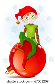 Christmas Elf sitting on Christmas ball