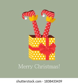 Christmas elf's legs are sticking out of the box. Shoes for elves feet, feet of gnomes-assistants of Santa Claus in a set of pants. Shoes, funny striped socks and boots. Vector illustration