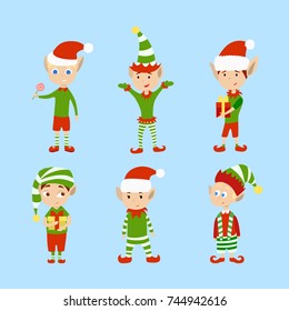 Christmas elves set. Funny cartoon creatures in green outfits.