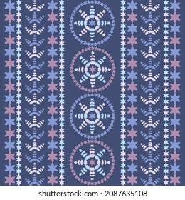 Christmas embroidery. Snowflakes. Seamless pattern. Festive fabric. Vector illustration for web design or printing.
