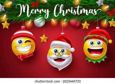 Diseño vectorial de los emojis de Navidad. Feliz navidad de texto con santa claus, elfo y personajes emojis colgando para la decoración navideña de fondo. Ilustración del vector
