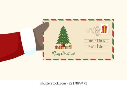 Christmas Envelope In Santa's Hand - Christmas Concept