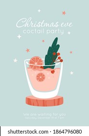 Christmas eve cocktail party invitation concept. Glass of pink drink with orange, berries branch and pine leaf decor. Luxury and elegant design card, poster for restaurant, bar, home gatherings