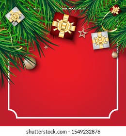 Christmas festival. gift box ball and  pine leaves on  red background