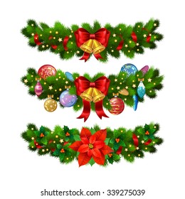 Christmas festive decoration from christmas tree branches, poinsettia, holly and gold bells with red ribbon