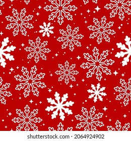 christmas festive pattern of curly snowflakes on a red background