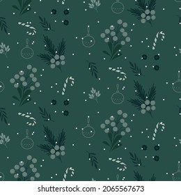 Christmas festive seamless pattern with green leaves, candy sticks, snow and berries background design