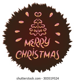 Christmas fir and the the words Merry Christmas in the style of caramel inscribed in a Chocolate Circle