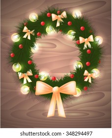 Christmas fir wreath with lights, ribbons and red balls for your creativity