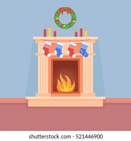 Christmas fireplace with socks, candles and wreath. Room interior with holiday decorations. Flat style vector illustration.
