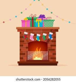 Christmas fireplace with socks decorations and christmas tree. Merry christmas