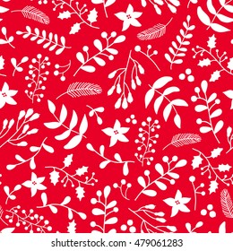 Christmas floral seamless vector pattern with holly, mistletoe and poinsettia. Simple doodle background in red and white colors. Great for gift packaging, wrapping paper, holiday decor