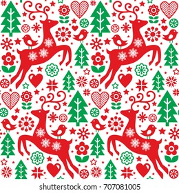 Christmas folk red and green seamless vector pattern, Scandinavian folk art, reindeer, birds and flowers decoration, wallpaper
