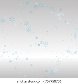 Christmas frame or border with random scatter falling blue snowflakes on a silvery background.