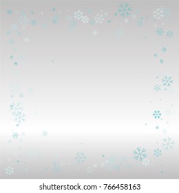 Christmas frame or border with random scatter falling blue snowflakes on a silvery background.