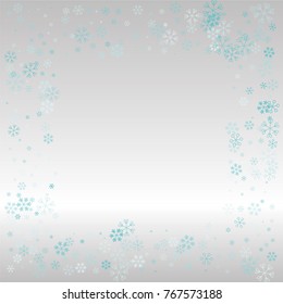 Christmas frame or border with random scatter falling blue snowflakes on a silvery background.