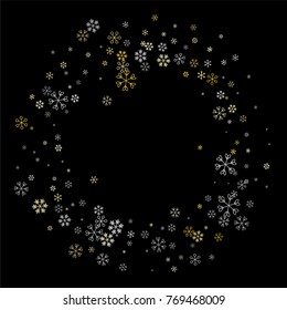 Christmas frame or border with random scatter falling silver and gold snowflakes isolated on black.