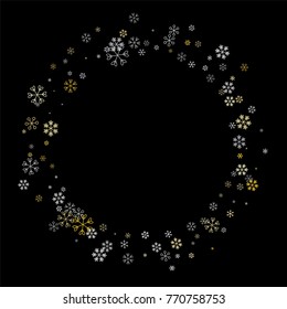 Christmas frame or border with random scatter falling silver and gold snowflakes isolated on black.