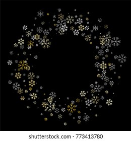 Christmas frame or border with random scatter falling silver and gold snowflakes isolated on black.