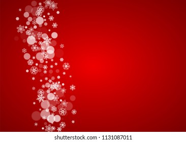 Christmas frame with falling snow on red background. Santa Claus colors. Horizontal Christmas frame with white frosty snowflakes for banners, gift cards, party invitations and special business offers.
