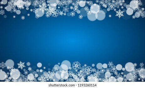 Christmas frame with falling snow on blue background. Horizontal Merry Christmas frame with white frosty snowflakes for banners, gift cards, party invitations and special business offers.
