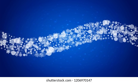 Christmas frame with falling snow on blue background with sparkles. Horizontal Christmas frame with white frosty snowflakes for banners, gift cards, party invitations and special business offers.