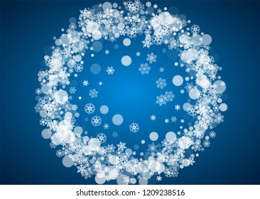 Christmas frame with falling snow on blue background. Horizontal Merry Christmas frame with white frosty snowflakes for banners, gift cards, party invitations and special business offers.