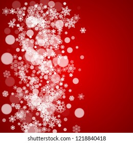 Christmas frame with falling snow on red background. Santa Claus colors. Merry Christmas frame with white frosty snowflakes for banners, gift cards, party invitations and special business offers.