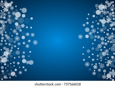 Christmas frame with falling snow on blue background. Horizontal Merry Christmas frame with white frosty snowflakes for banners, gift cards, party invitations and special business offers.