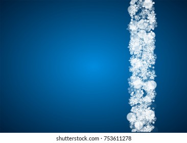 Christmas frame with falling snow on blue background. Horizontal Merry Christmas frame with white frosty snowflakes for banners, gift cards, party invitations and special business offers.