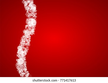 Christmas frame with falling snow on red background. Santa Claus colors. Horizontal Christmas frame with white frosty snowflakes for banners, gift cards, party invitations and special business offers.
