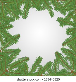 Christmas frame made of hand drawn fir tree brunches. Winter boarder with place for the text in the middle.