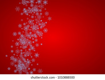 Christmas frame with snowflakes on red background. Santa Claus colors. Horizontal Christmas frame for holiday banners, cards, sales, special offers. Falling snow with bokeh and flakes for celebration