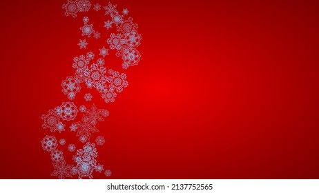 Christmas frame with snowflakes on red background. Santa Claus colors. Horizontal Christmas frame for holiday banners, cards, sales, special offers. Falling snow with bokeh and flakes for celebration