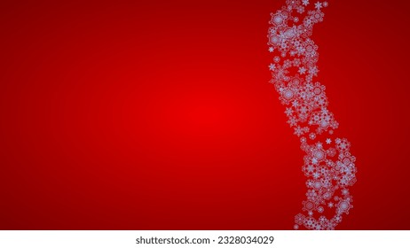 Christmas frame with snowflakes on red background. Santa Claus colors. Horizontal Christmas frame for holiday banners, cards, sales, special offers. Falling snow with bokeh and flakes for celebration