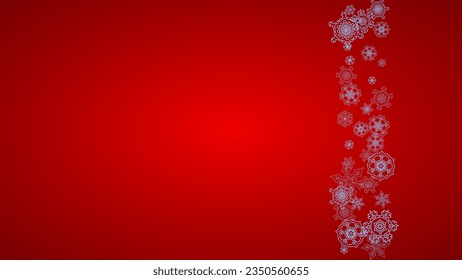 Christmas frame with snowflakes on red background. Santa Claus colors. Horizontal Christmas frame for holiday banners, cards, sales, special offers. Falling snow with bokeh and flakes for celebration