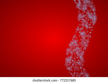 Christmas frame with snowflakes on red background. Santa Claus colors. Horizontal Christmas frame for holiday banners, cards, sales, special offers. Falling snow with bokeh and flakes for celebration