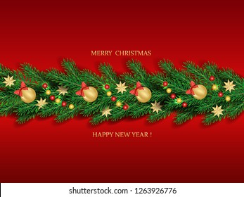 Christmas garland of fir branches, golden balls and decorative stars